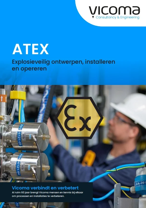 A technician works on explosion-proof equipment marked with the ATEX logo in an industrial setting.